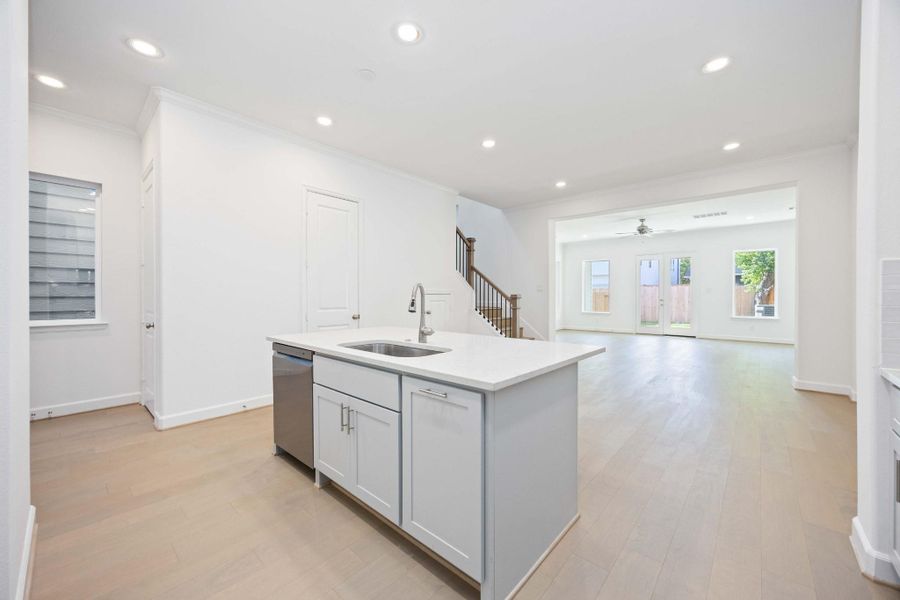 Cook, serve, and socialize without missing a moment — this layout was made for entertaining.