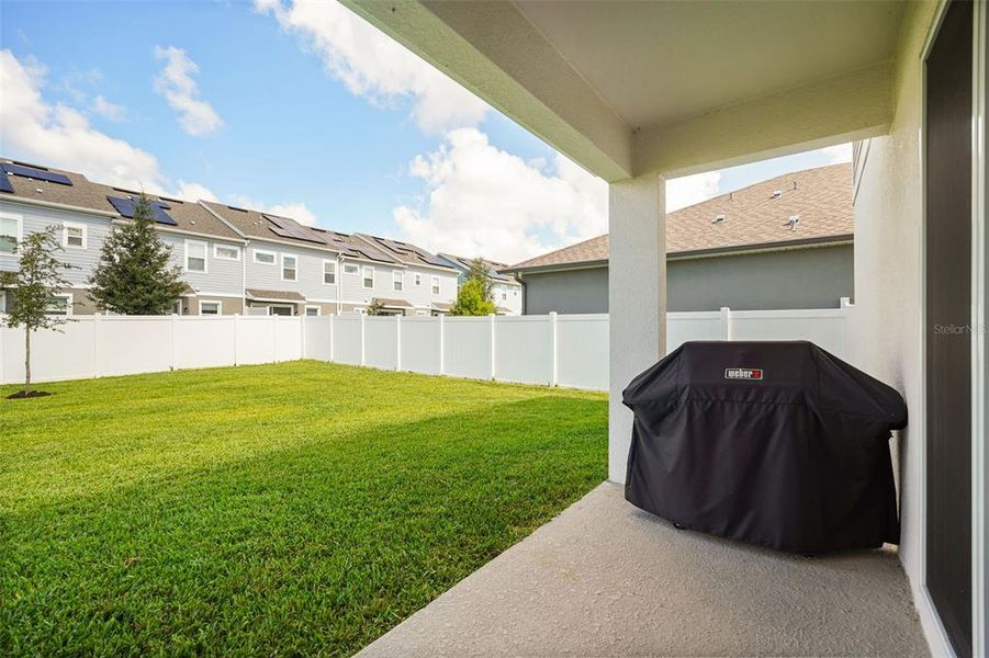 Exterior details and patio area of a home in Prairie Oaks, St. Cloud (Image 3).