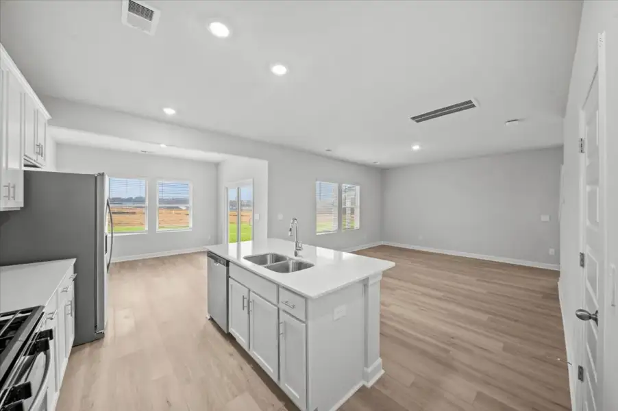 Furnished interior view inside a new home in The Farm at Wells Creek - Heritage Collection, Gray Court (Image 6).