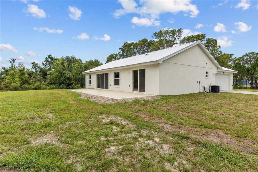 Exterior details and patio area of a home in , Haines City (Image 24).