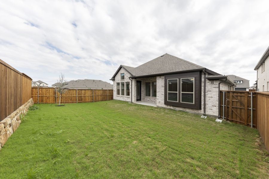 Exterior details and patio area of a home in Sutton Fields, Celina (Image 2). Exterior details and patio area of a home in Sutton Fields, Celina (Image 2).