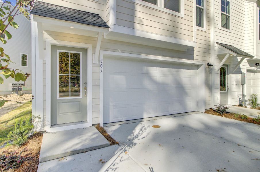 Exterior details and patio area of a home in Indigo Grove Townhomes, Johns Island (Image 3).