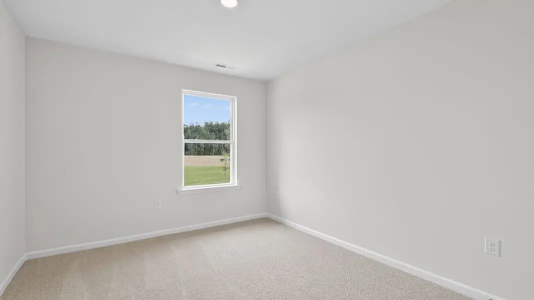 Spacious, unfurnished interior of a new home in The Townes at Anderson Farm, Wendell (Image 20).