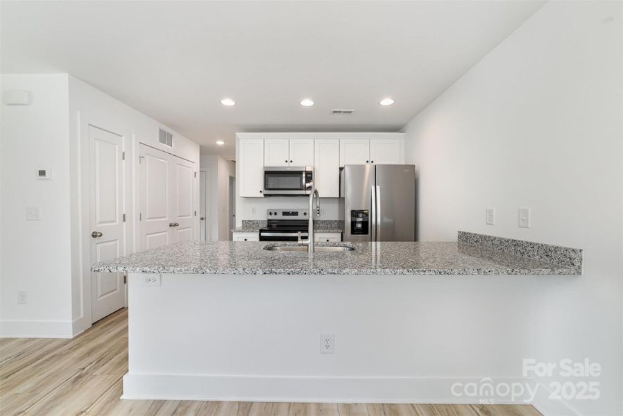 Furnished interior view inside a new home in , Salisbury (Image 3).
