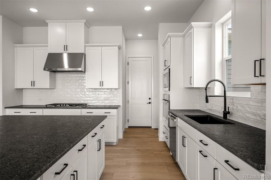 Furnished interior view inside a new home in Wolf Ranch - Enclave Collection, Colorado Springs (Image 9).
