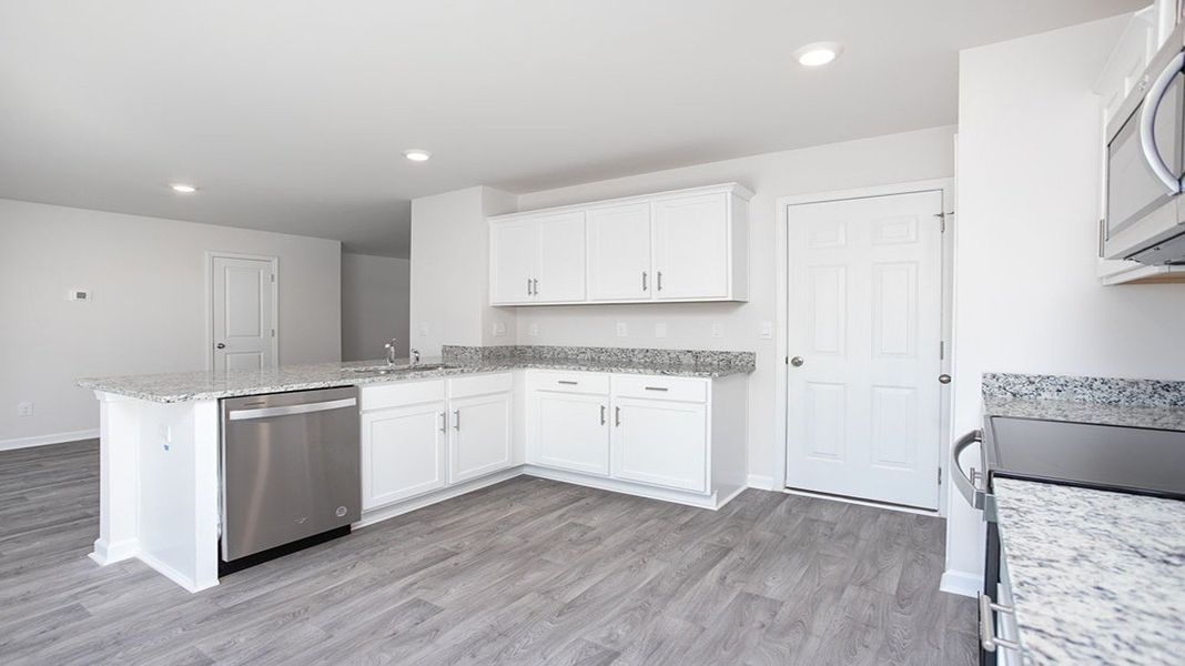 Furnished interior view inside a new home in Jetstream Park, Wilson (Image 7).