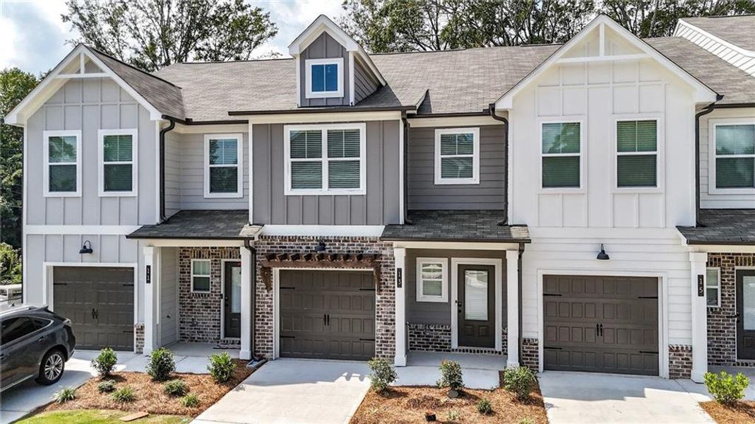 Front exterior of a new home in , Austell, GA, highlighting curb appeal (Image 1). Front exterior of a new home in , Austell, GA, highlighting curb appeal (Image 1).