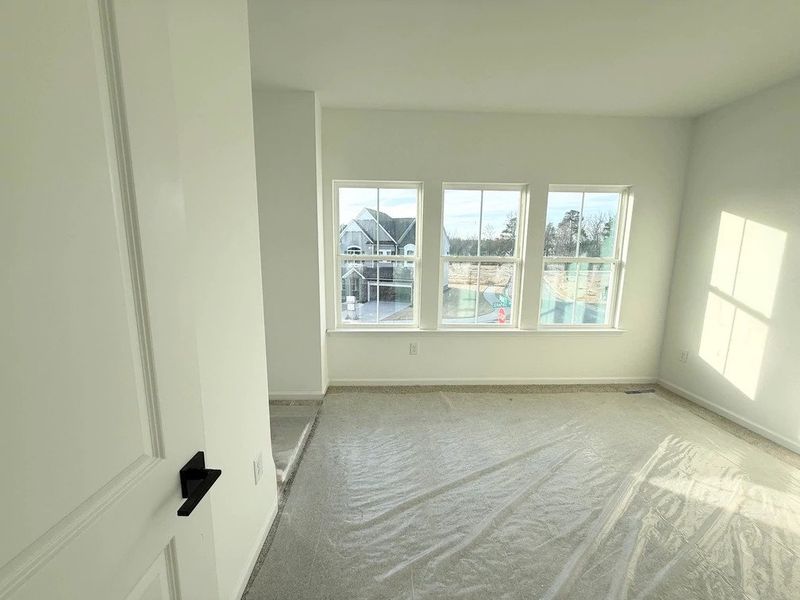 Bedroom 3 featuring AW Collection® Oxford -  Natural tones and timeless comfort.