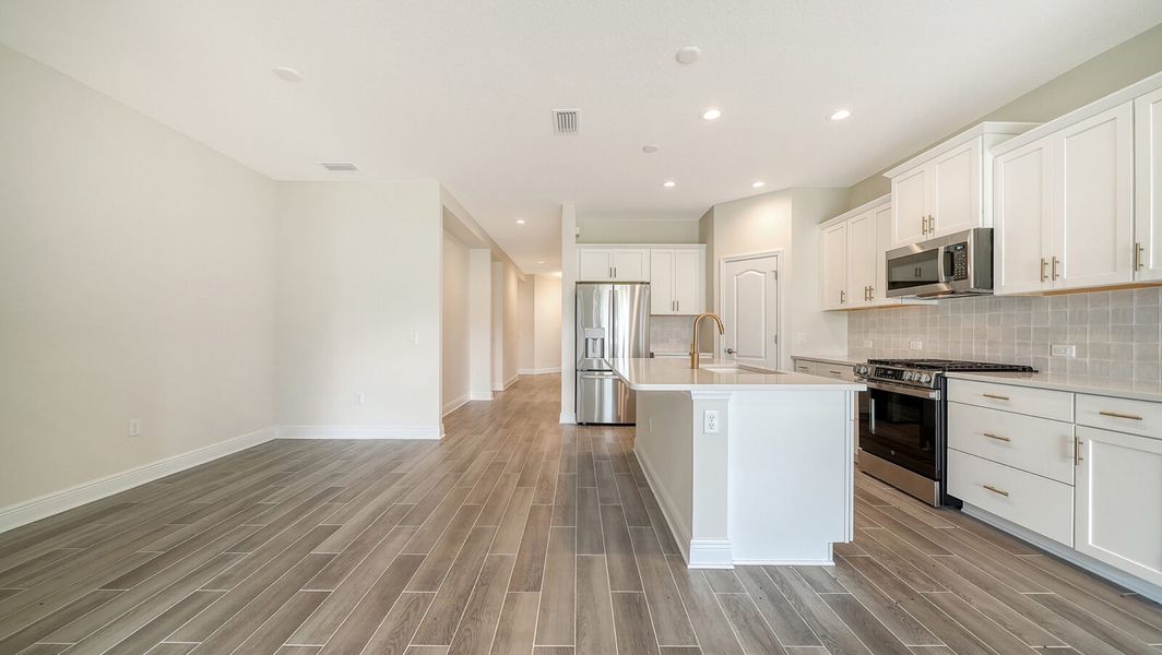 Furnished interior view inside a new home in Wildleaf at North River Ranch, Parrish (Image 8).