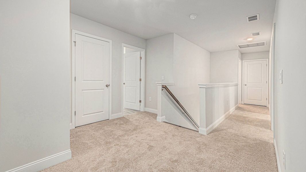 Spacious, unfurnished interior of a new home in Chapman Village, Conway (Image 18).