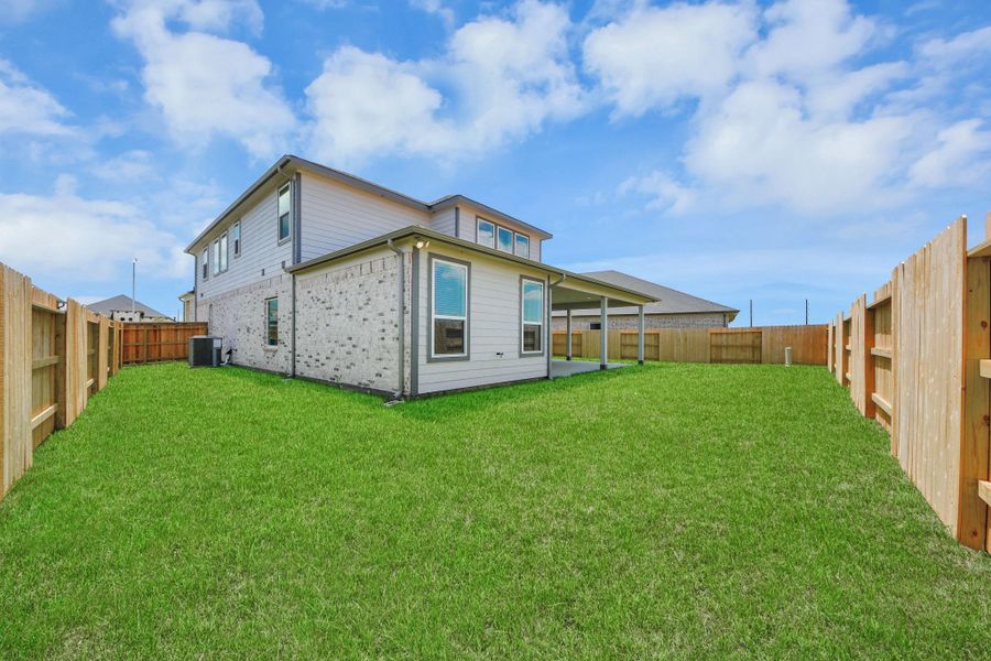 Backyard retreat, offering an abundance of space for kids to play and explore. The possibilities are endless in this outdoor haven, where the joy of open-air activities and family gatherings awaits.