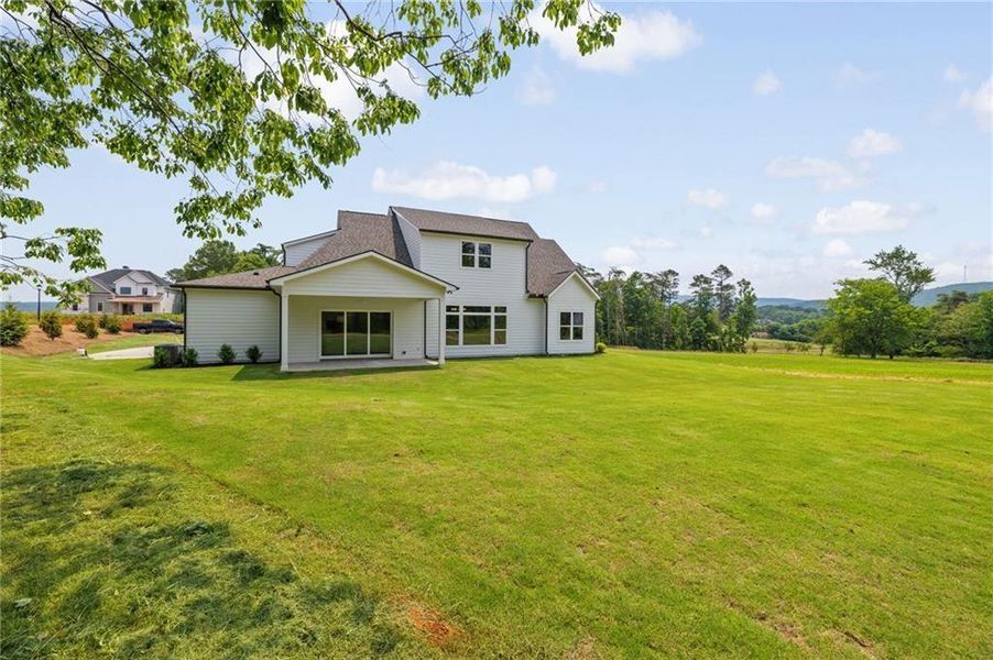 Front exterior of a new home in , Rydal, GA, highlighting curb appeal (Image 25). Front exterior of a new home in , Rydal, GA, highlighting curb appeal (Image 25).
