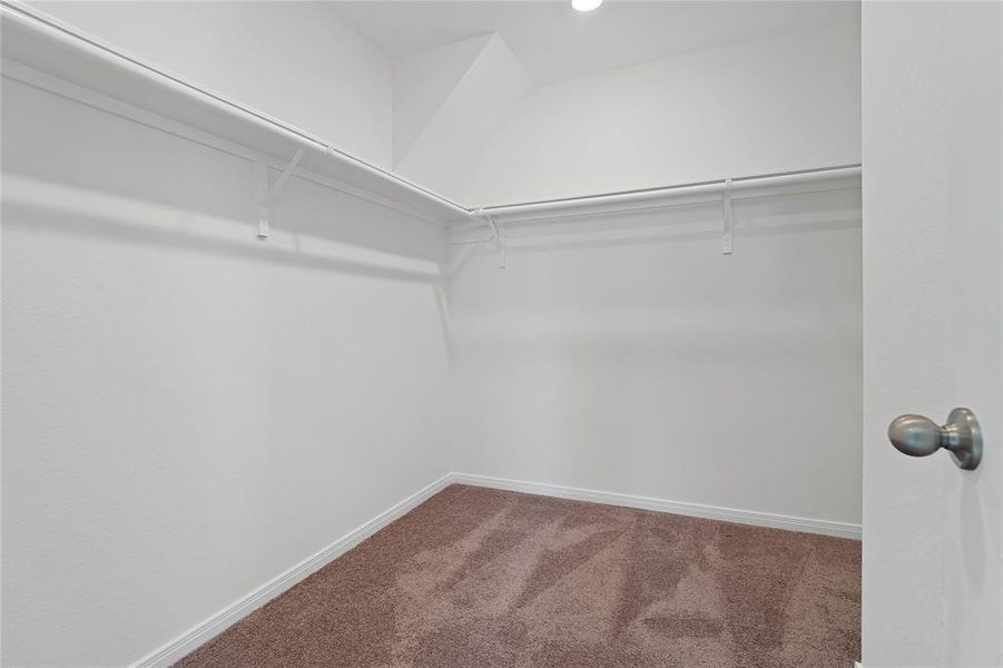 Look at this immaculate closet! With high shelving, multiple rows to hang clothing, you are sure to have enough room for all your belongings!