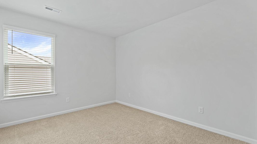 Spacious, unfurnished interior of a new home in Pineview North, Summerville (Image 22).