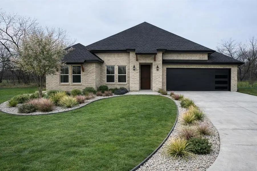 Front exterior of a new home in , Sherman, TX, highlighting curb appeal (Image 1). Front exterior of a new home in , Sherman, TX, highlighting curb appeal (Image 1).