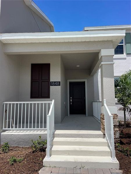 Front exterior of a new home in , Kissimmee, FL, highlighting curb appeal (Image 17). Front exterior of a new home in , Kissimmee, FL, highlighting curb appeal (Image 17).