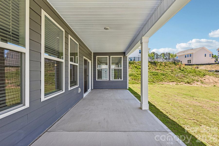 Exterior details and patio area of a home in Westport, York (Image 22).
