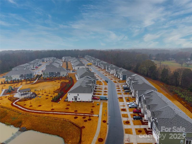 Front exterior of a new home in Secrest Landing, Monroe, NC, highlighting curb appeal (Image 24). Front exterior of a new home in Secrest Landing, Monroe, NC, highlighting curb appeal (Image 24).