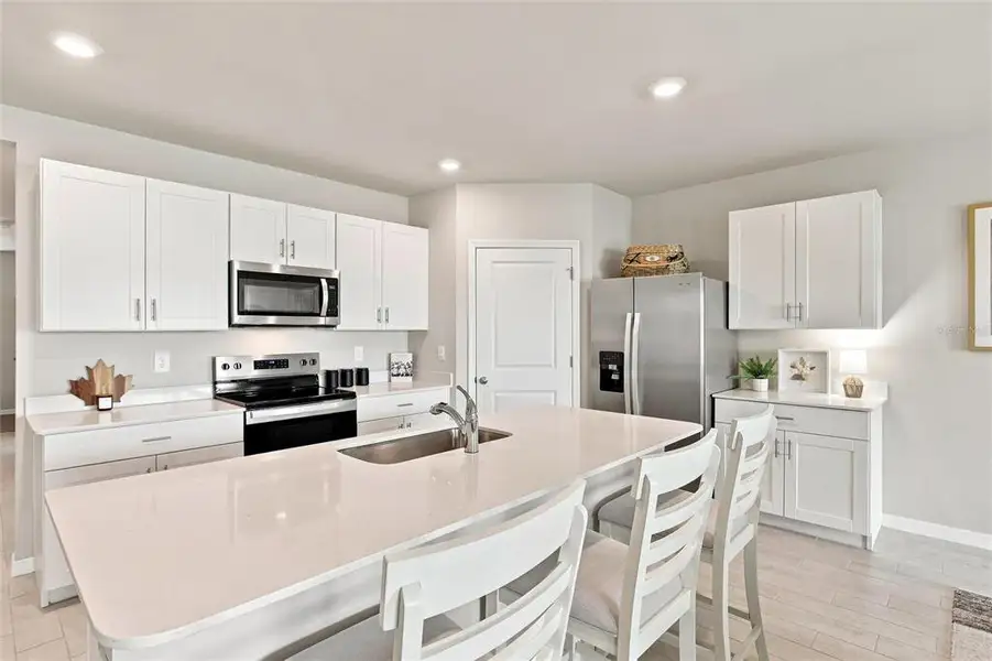 Furnished interior view inside a new home in Central Parc, North Port (Image 13). Furnished interior view inside a new home in Central Parc, North Port (Image 13).