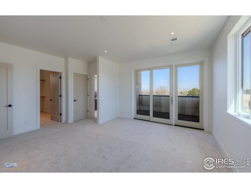 Primary Bedroom With Covered Deck Perfect For Morning Coffee Or Evening Sunsets