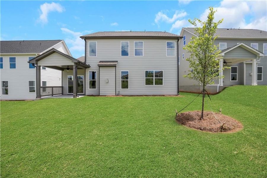 Exterior details and patio area of a home in Twin Lakes, Hoschton (Image 3).