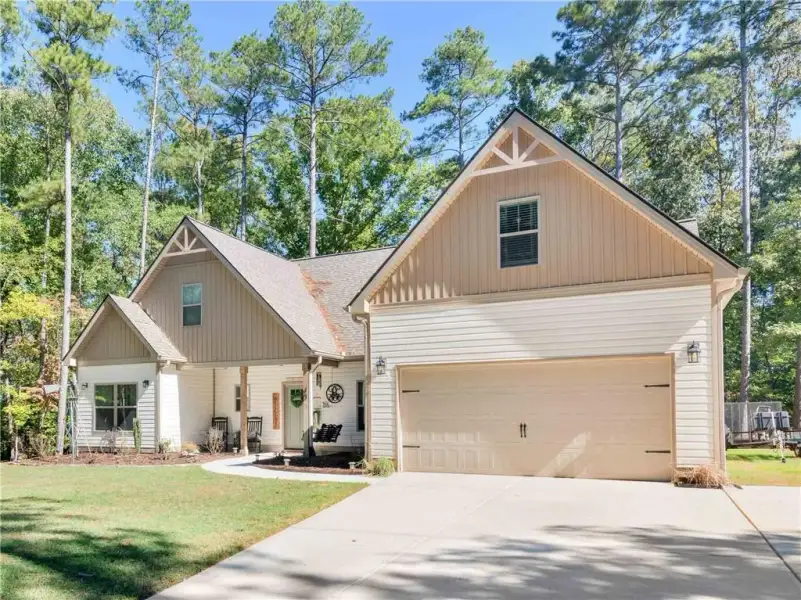 Front exterior of a new home in , Monticello, GA, highlighting curb appeal (Image 21).