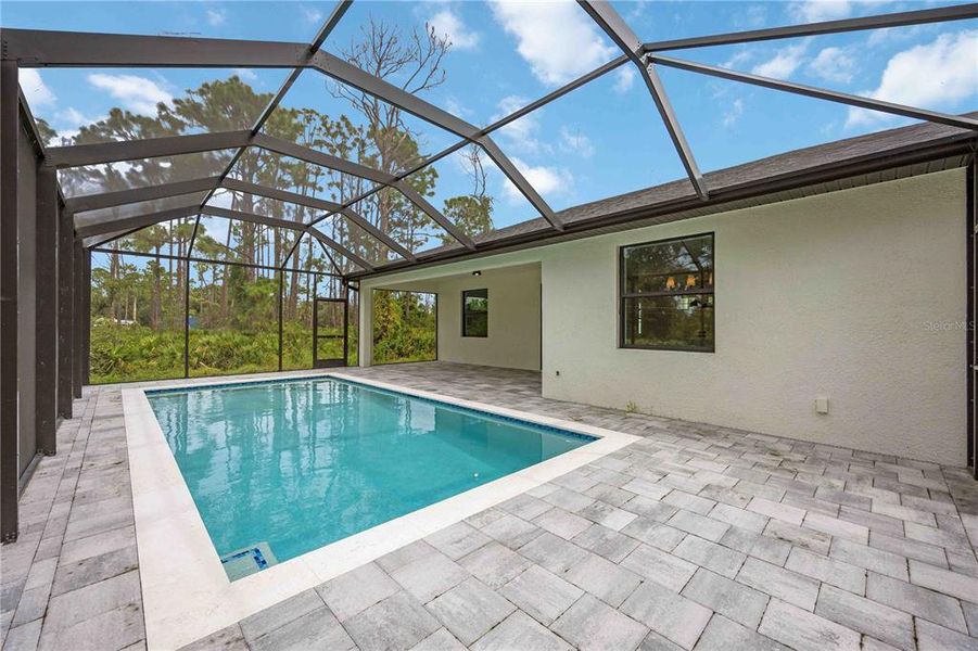 Exterior details and patio area of a home in , Port Charlotte (Image 22).