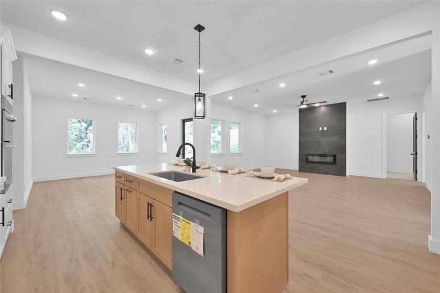 Kitchen open to Grand room and dining space