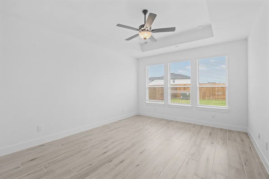 Representative unfurnished interior of a home built from the Madison by Chesmar Homes in Grange, Katy (Image 33).