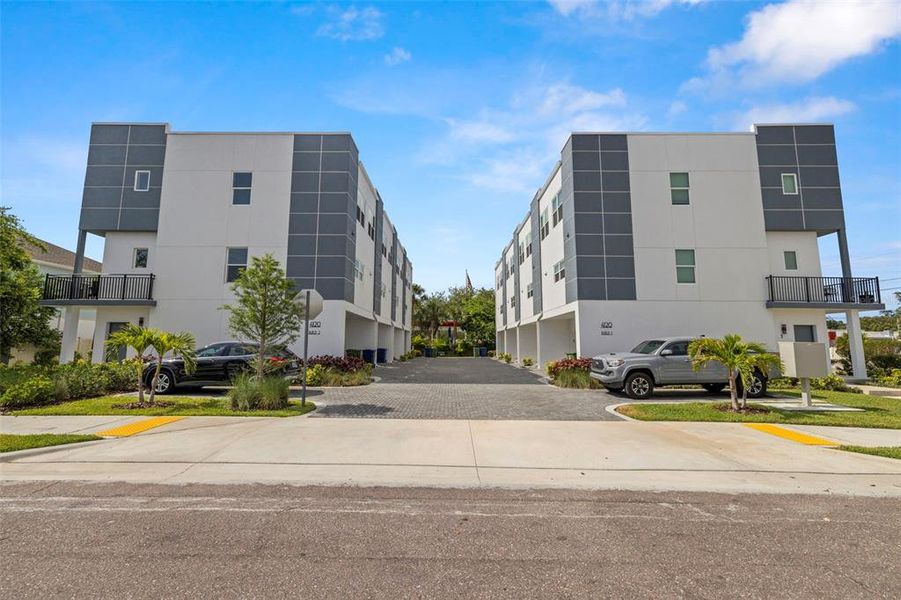 Front exterior of a new home in , Tampa, FL, highlighting curb appeal (Image 18).