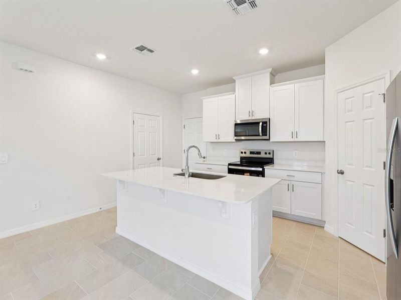 Furnished interior view inside a new home in The Meadow at Crossprairie Bungalows, St. Cloud (Image 3).