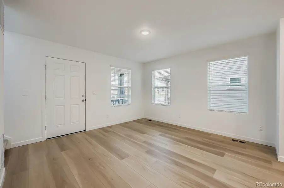 Spacious, unfurnished interior of a new home in Percheron: The Explorer Collection, Colorado Springs (Image 8).