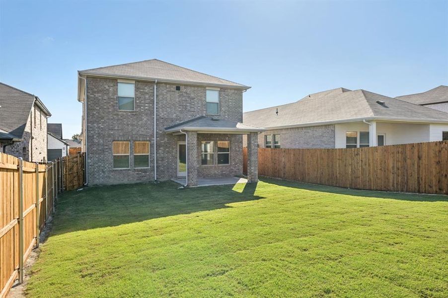 Exterior details and patio area of a home in Simpson Crossing - Spring Series, McKinney (Image 27).