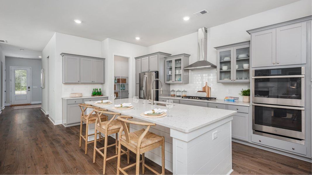 Furnished interior view inside a new home in Carnes Crossroads: Row Collection, Summerville (Image 8).