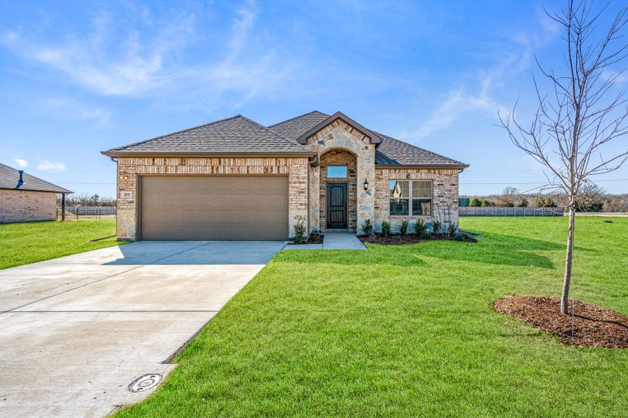 Front exterior of a new home in Mallard Point, Greenville, TX, highlighting curb appeal (Image 14). Front exterior of a new home in Mallard Point, Greenville, TX, highlighting curb appeal (Image 14).