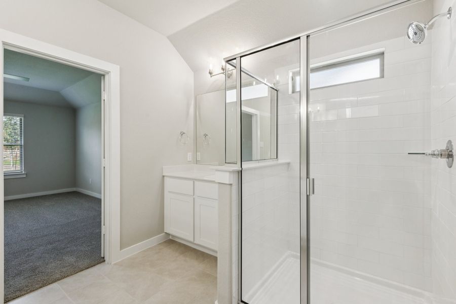 Primary Bathroom in the Heisman home plan by Trophy Signature Homes – REPRESENTATIVE PHOTO Primary Bathroom in the Heisman home plan by Trophy Signature Homes – REPRESENTATIVE PHOTO