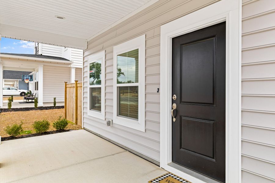 Exterior details and patio area of a home in Sweetgrass at Summers Corner, Summerville (Image 23).