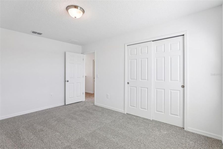 Spacious, unfurnished interior of a new home in Lake Deer Estates - Signature Series, Poinciana (Image 37). Spacious, unfurnished interior of a new home in Lake Deer Estates - Signature Series, Poinciana (Image 37).