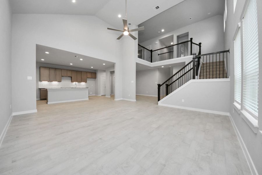 Take another glimpse into the heart of the home with this additional view of thefamily room—a sprawling space ready to accommodate all your gatherings. Sample photo of completed home with similar floor plan. Actual colors and selections may vary. Take another glimpse into the heart of the home with this additional view of thefamily room—a sprawling space ready to accommodate all your gatherings. Sample photo of completed home with similar floor plan. Actual colors and selections may vary.