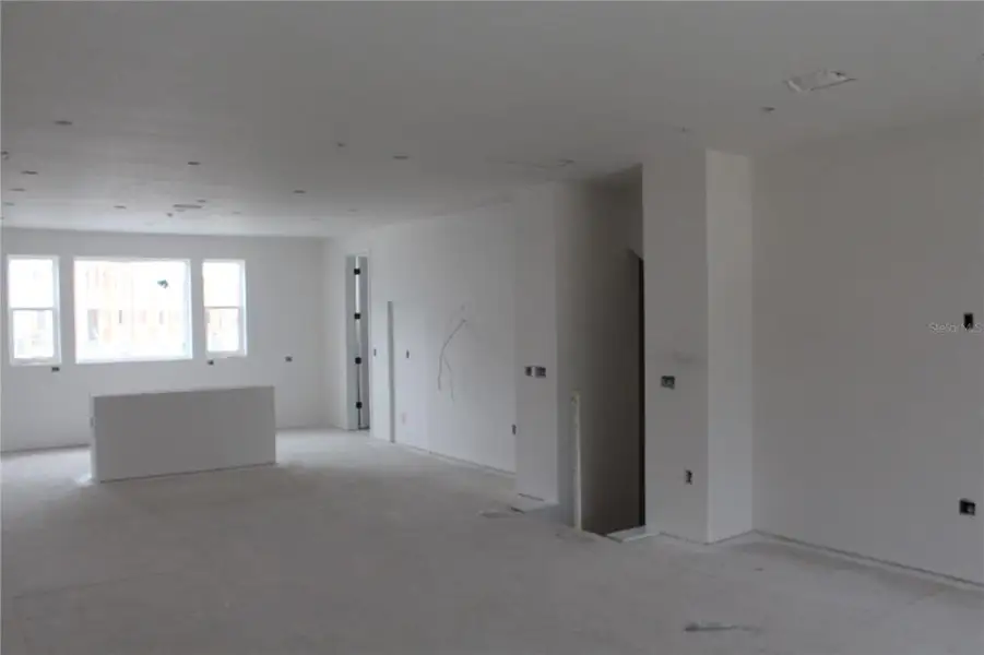 In-progress construction of a new home in EvenTide, New Smyrna Beach, FL (Image 21).