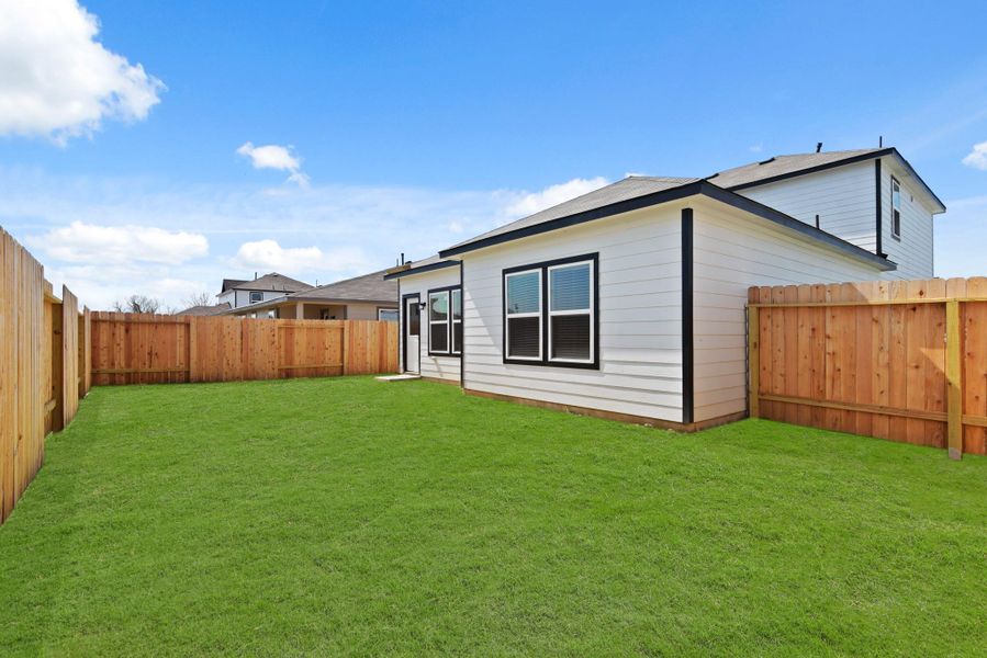 Front exterior of a new home in The Villages at Westpointe, Dayton, TX, highlighting curb appeal (Image 2). Front exterior of a new home in The Villages at Westpointe, Dayton, TX, highlighting curb appeal (Image 2).