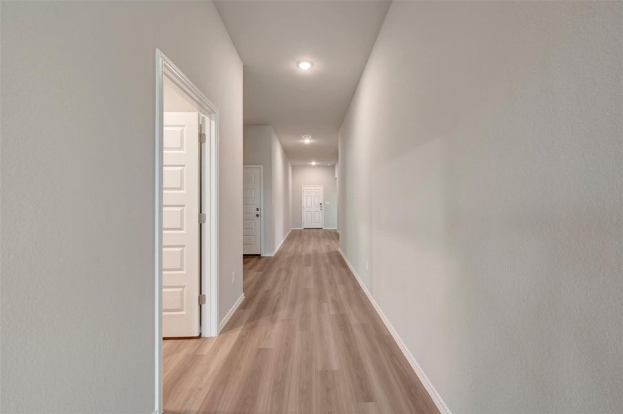 Spacious, unfurnished interior of a new home in Carillon, Manor (Image 25).