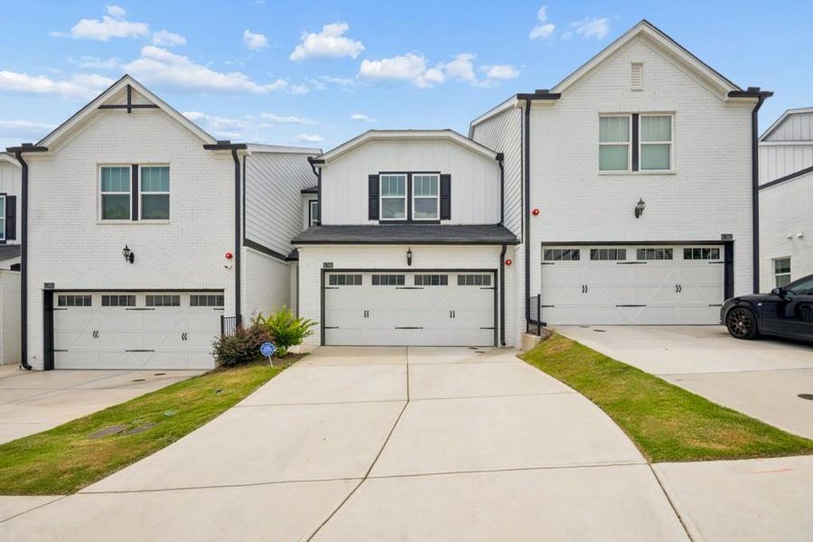 Front exterior of a new home in Brooks at Riverview Landing, Smyrna, GA, highlighting curb appeal (Image 2). Front exterior of a new home in Brooks at Riverview Landing, Smyrna, GA, highlighting curb appeal (Image 2).