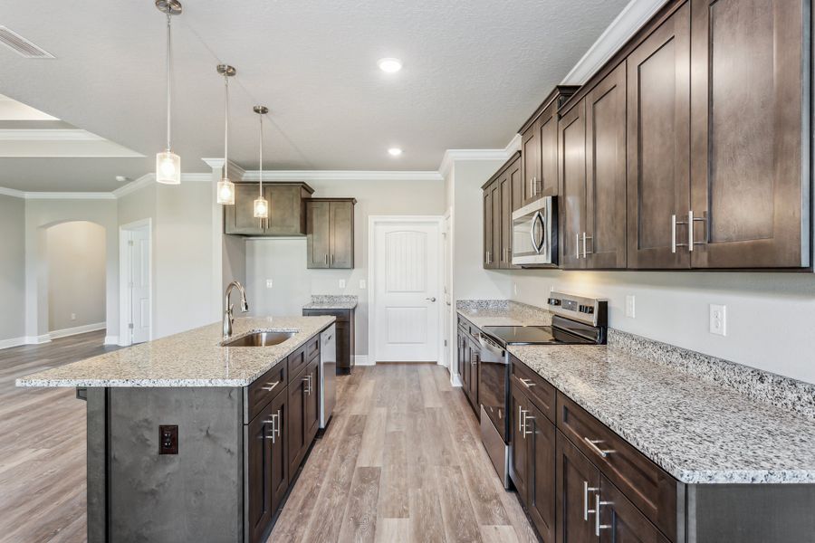 Representative furnished interior of a home built from the The Sapphire by Herbst Homes in Prosperity Point, Milton (Image 68).