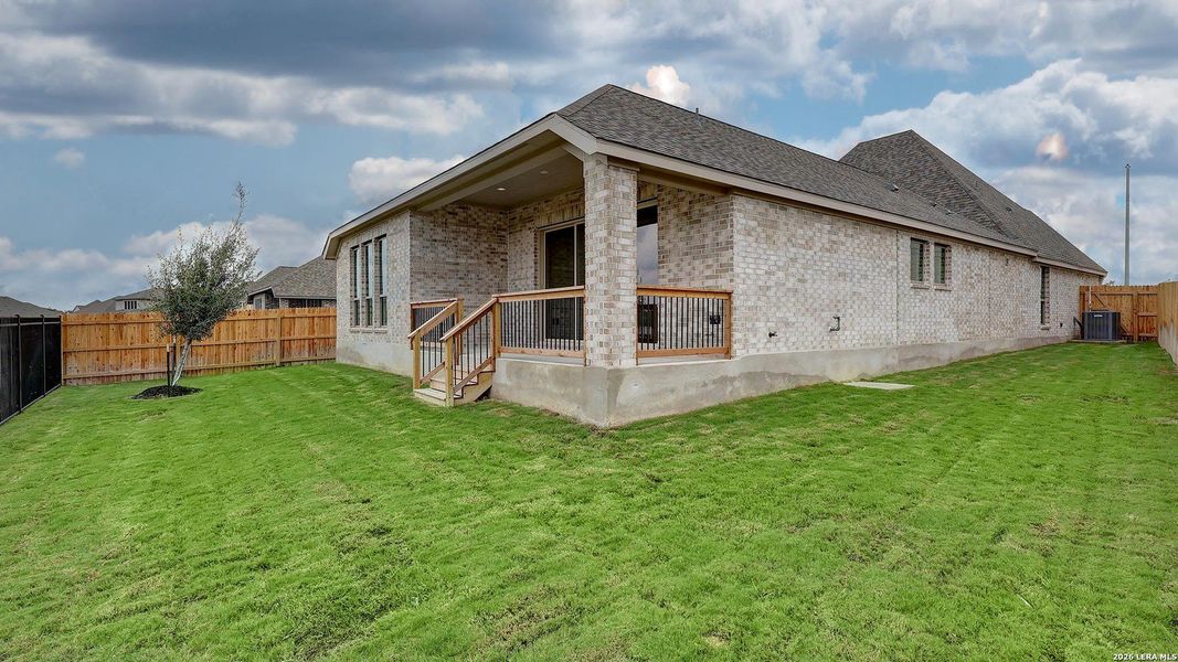 Exterior details and patio area of a home in Alsatian Oaks, Castroville (Image 25).