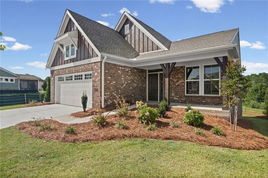 Front exterior of a new home in Laurel Farms, Dallas, GA, highlighting curb appeal (Image 23).
