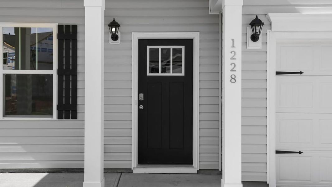 Exterior details and patio area of a home in Hunters Ridge, Woodruff (Image 4).