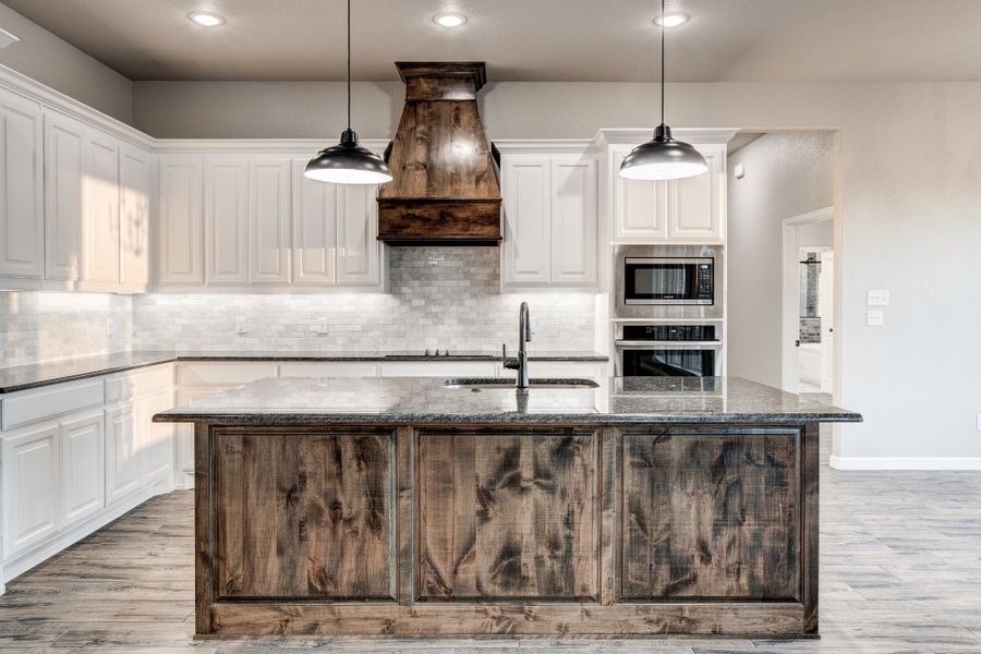 Representative furnished interior of a home built from the The Jackson by Doug Parr Custom Homes in Monarch Manor, Poolville (Image 6).