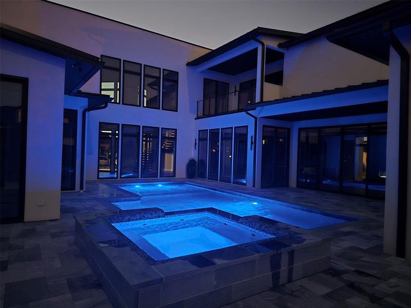 View of pool featuring an in ground hot tub