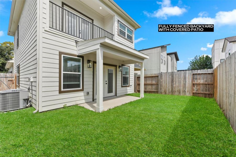 Exterior details and patio area of a home in , Houston (Image 3).